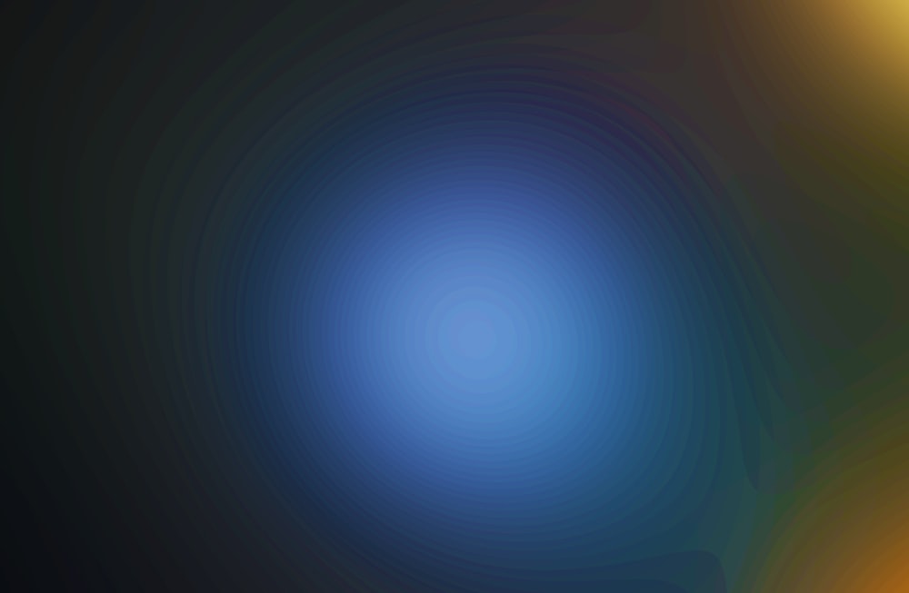 a blurry image of a blue and yellow background