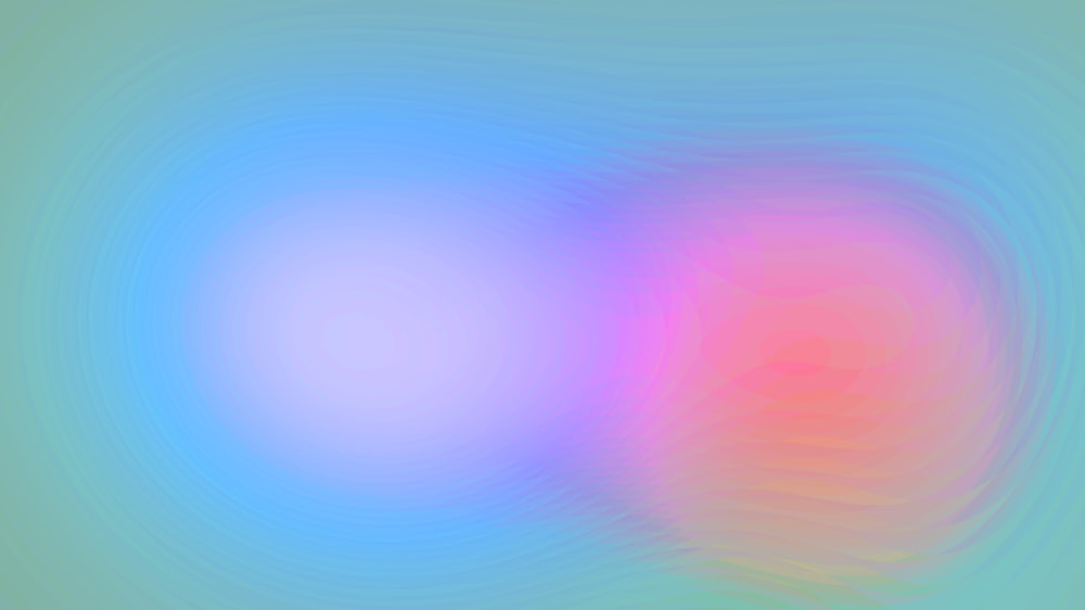 a blurry image of a blue and pink background