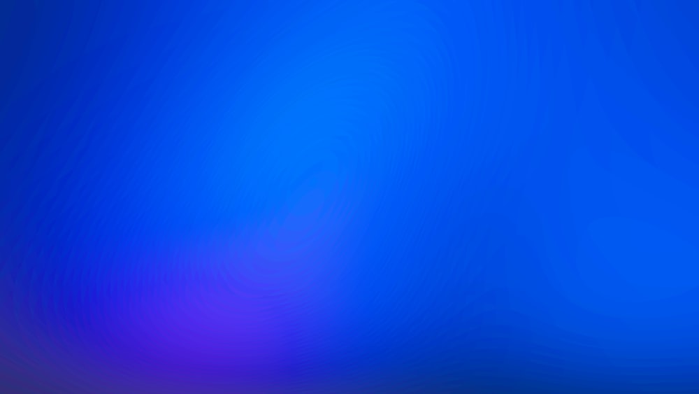 a blurry image of a blue and purple background