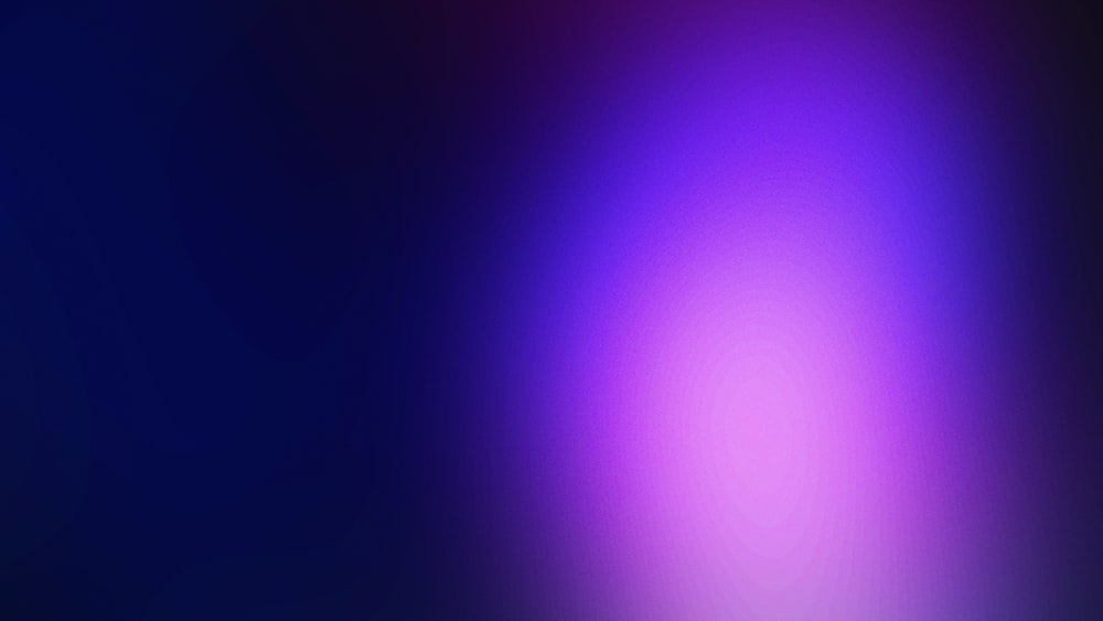 a blurry image of a blue and purple background