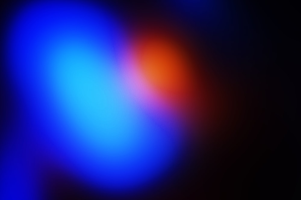 a blurry image of a blue and orange light
