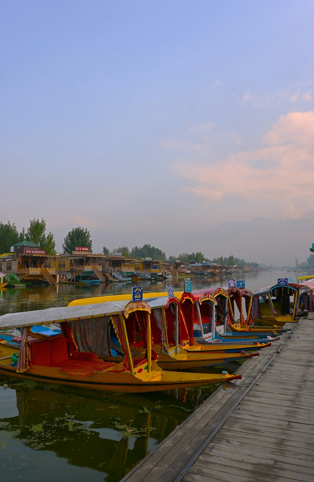 a bunch of boats that are sitting in the water