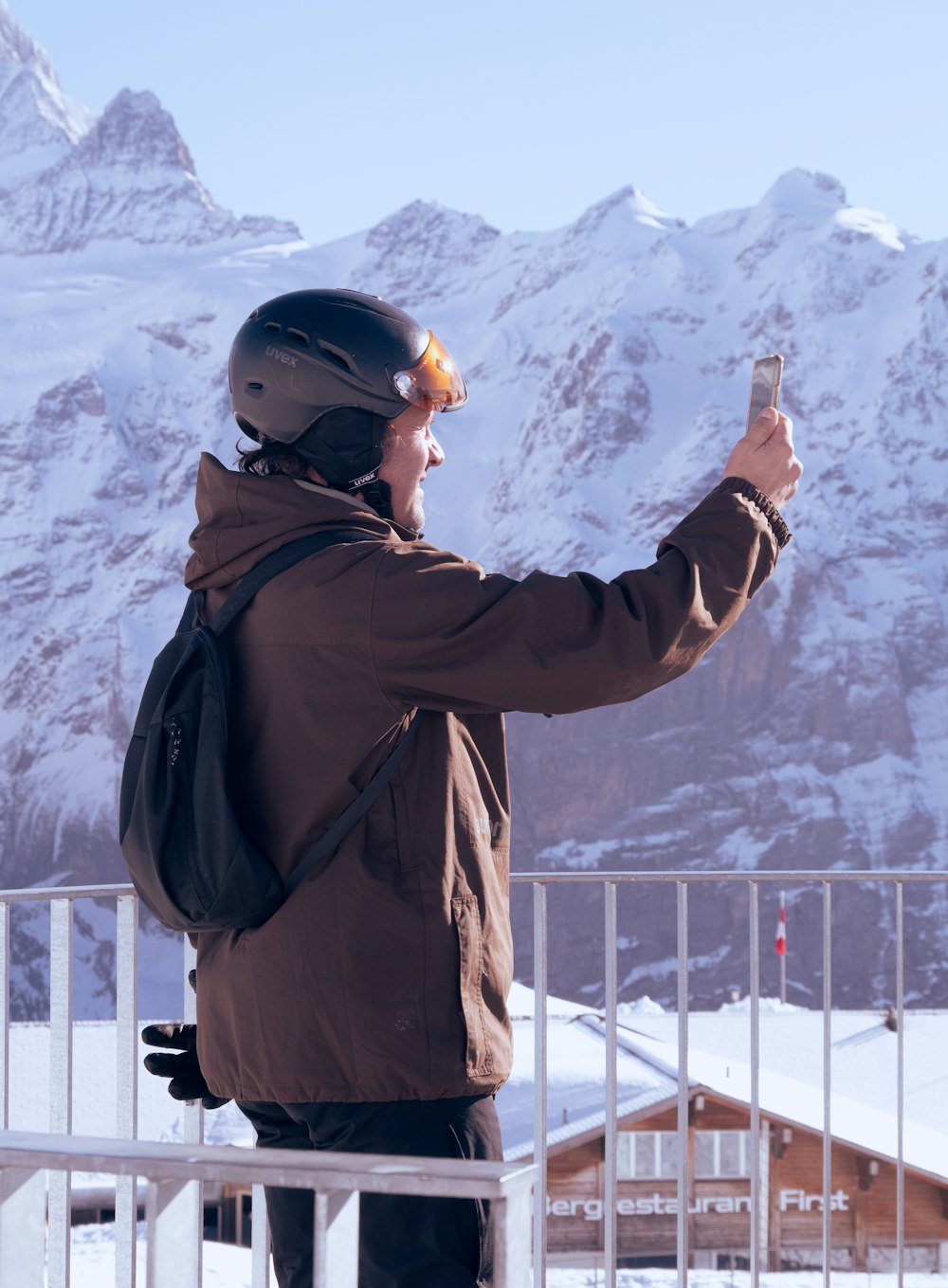 a man taking a picture with his cell phone