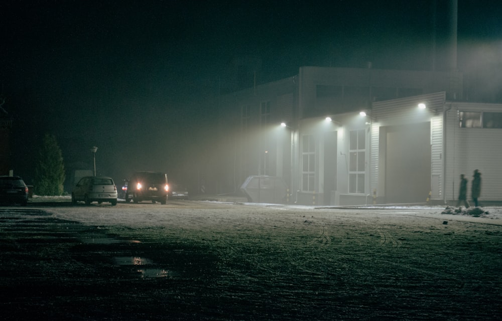 a couple of trucks parked in front of a building