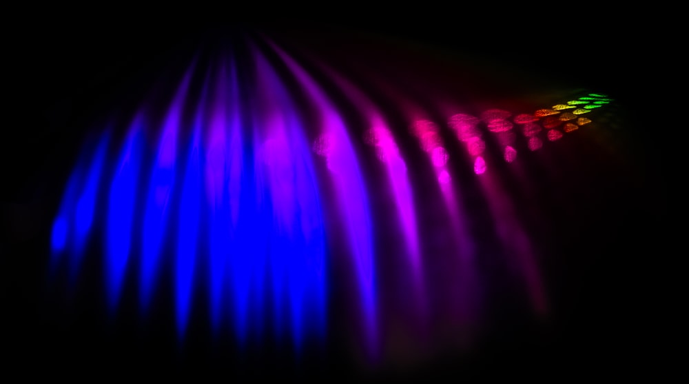 a close up of a light show in the dark