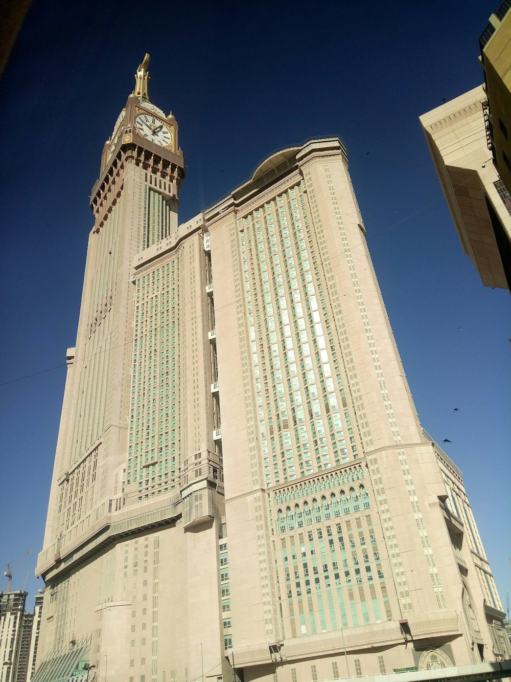 a tall building with a clock on the top of it