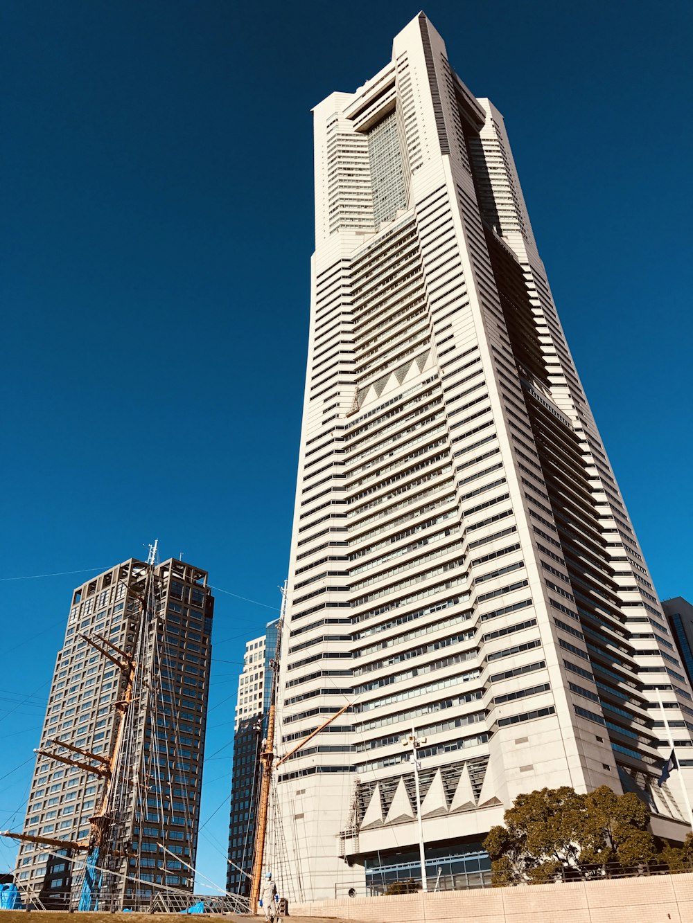 a tall building with a clock on the side of it