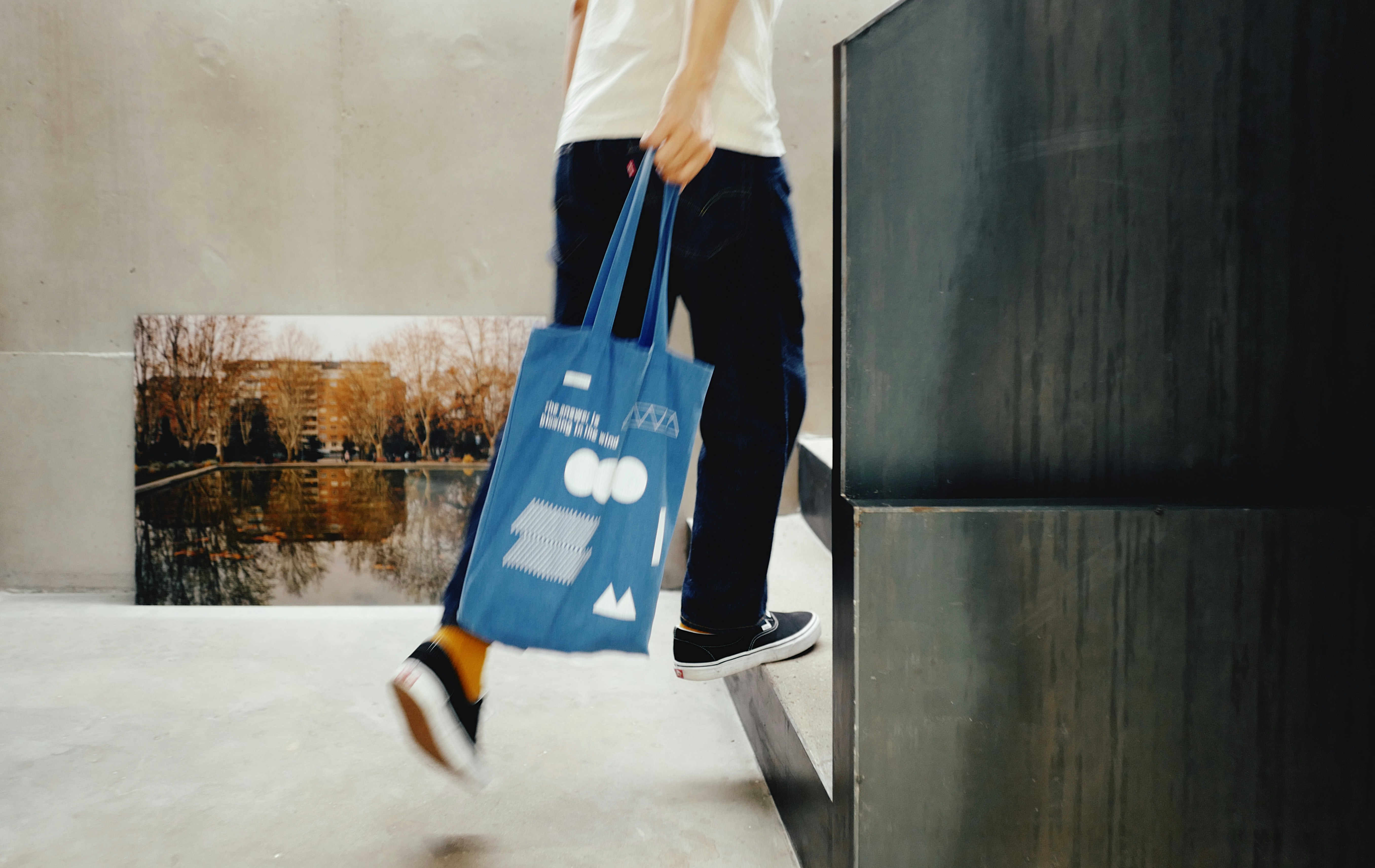 Person easily carrying groceries from their car into an apartment building lobby - Chicago apartments with parking