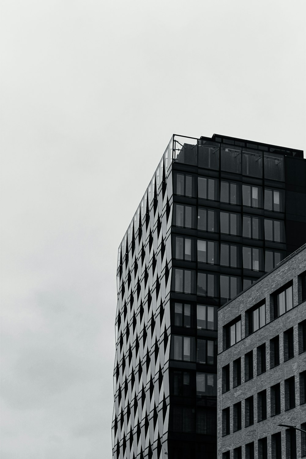 a black and white photo of a tall building