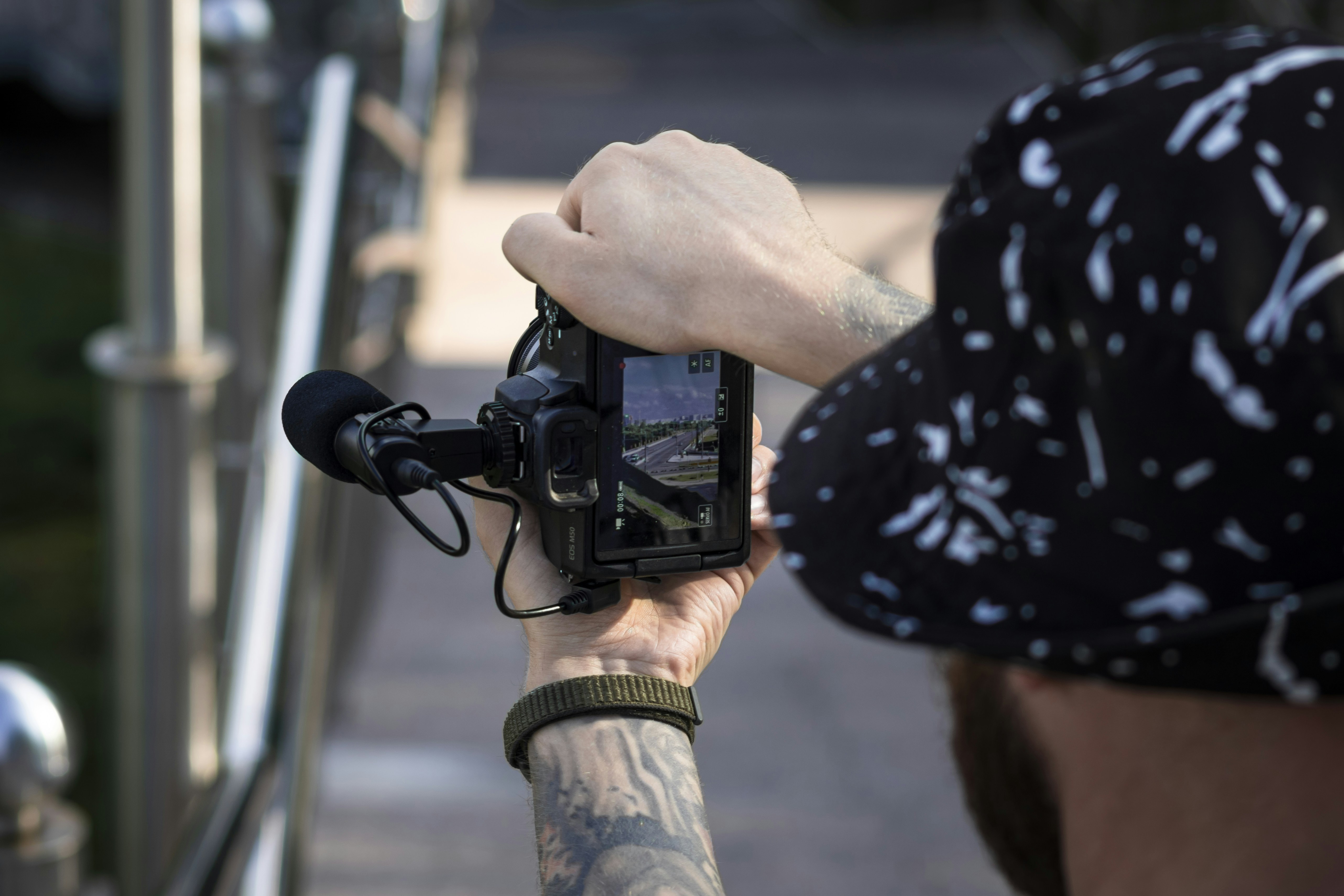 a man taking a picture with his cell phone