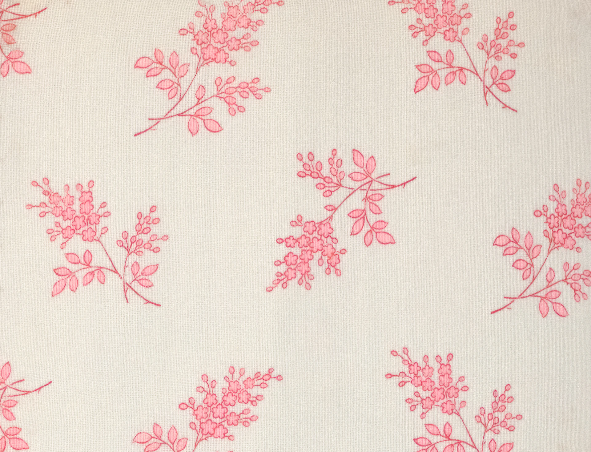 Delicate pink floral pattern on a cream background
