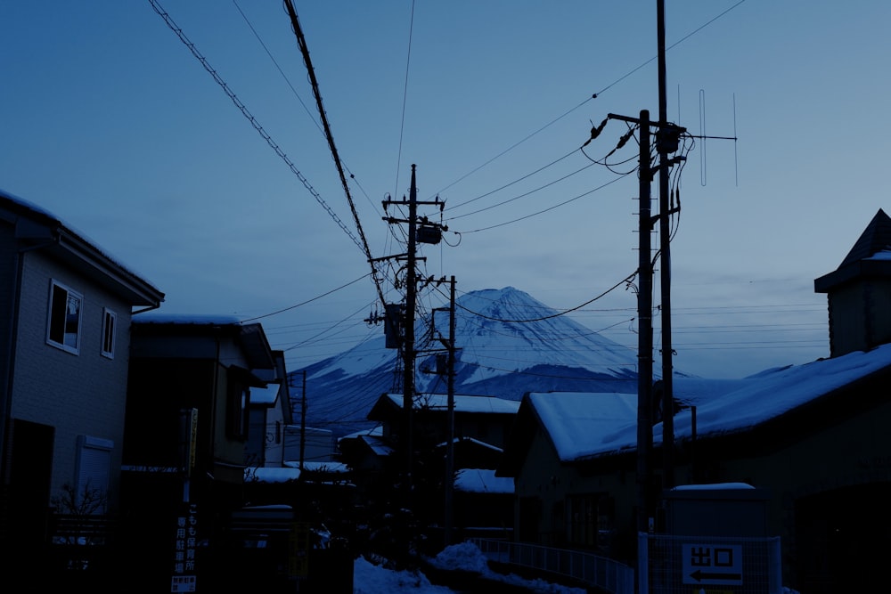 a view of a snow covered mountain in the distance