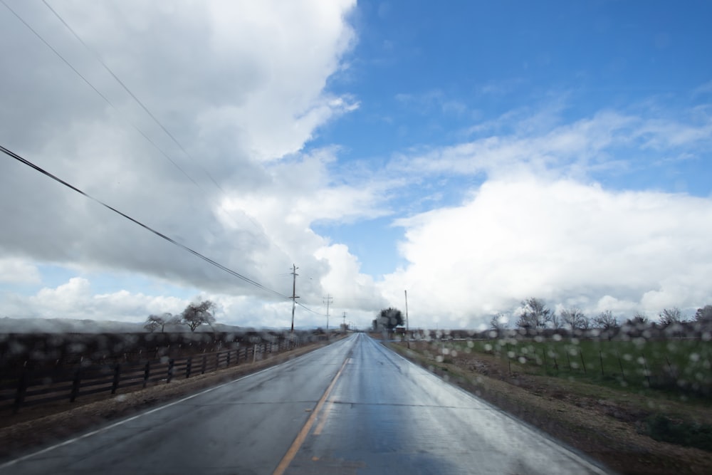 a view of a road from a car window