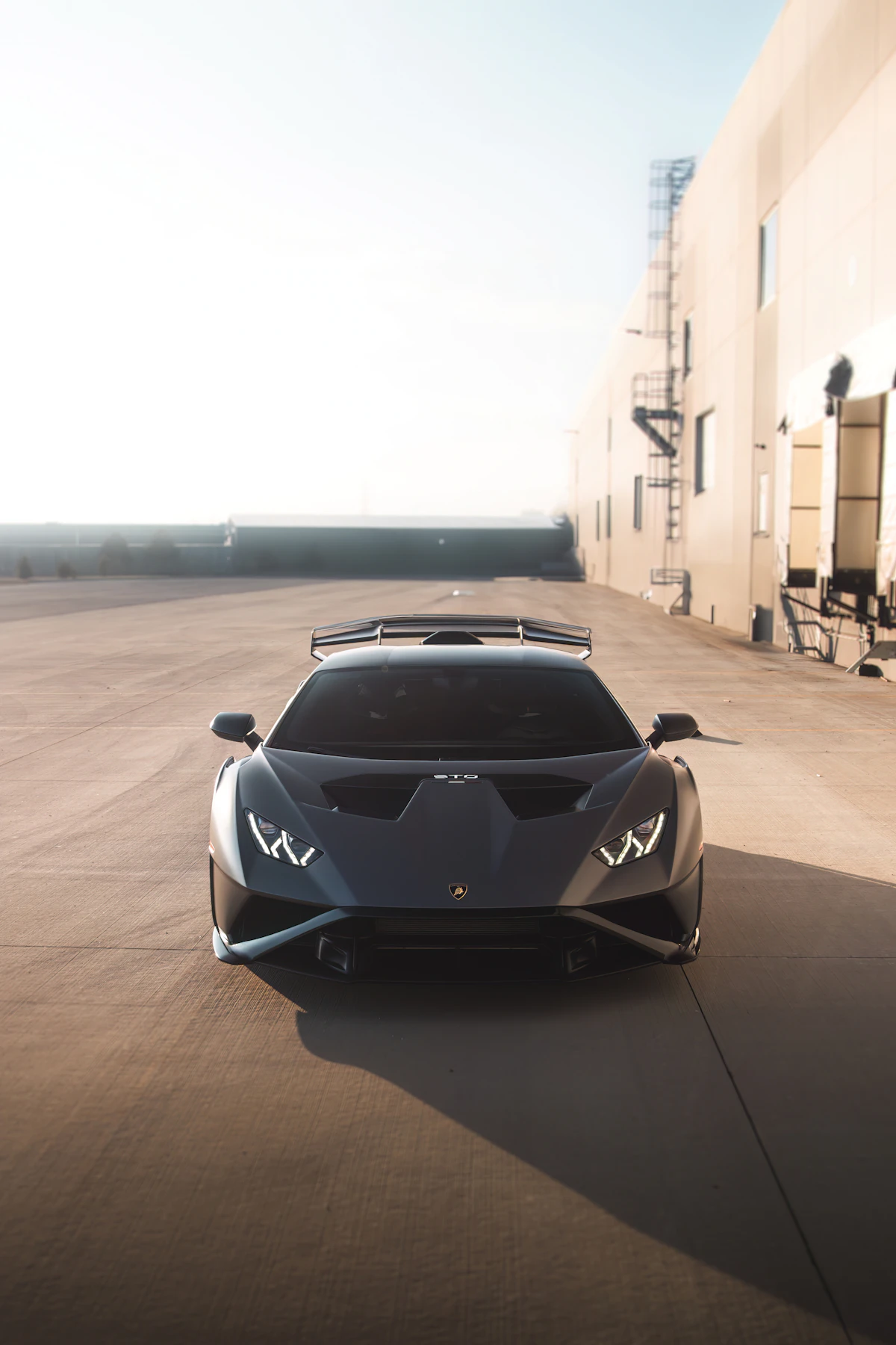 Sports car in front of a modern building