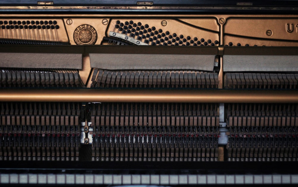 a close up of a piano with the keys missing