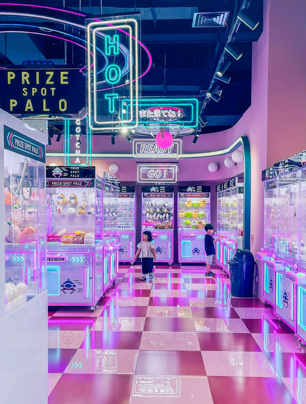 a store with a checkered floor and neon lights