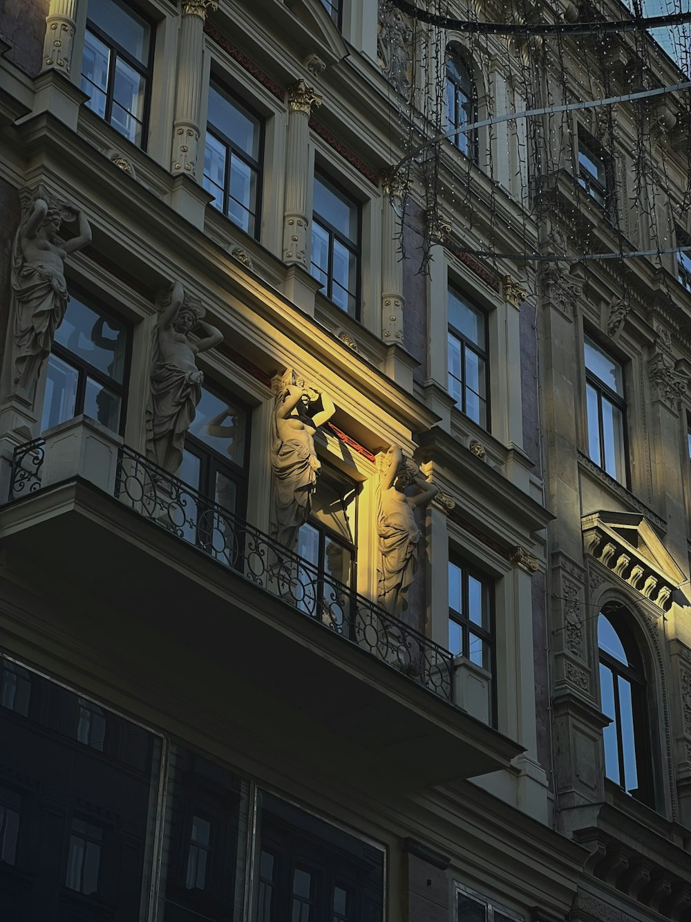 a tall building with a clock on the side of it