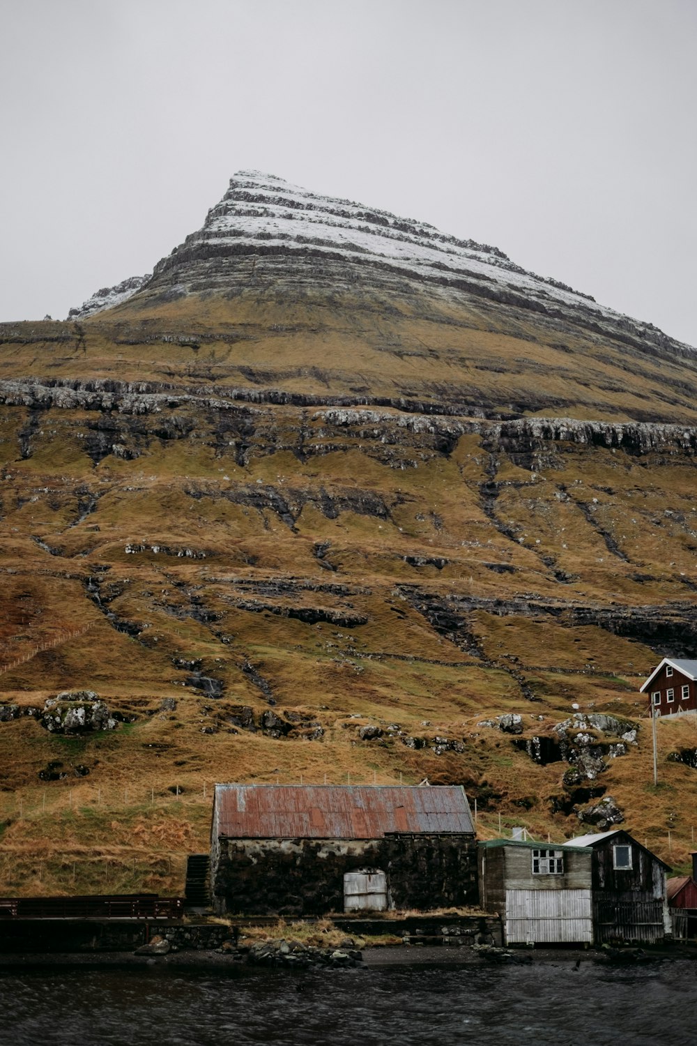 a hill that has a house on top of it