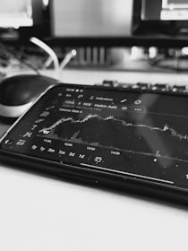 a tablet computer sitting on top of a desk