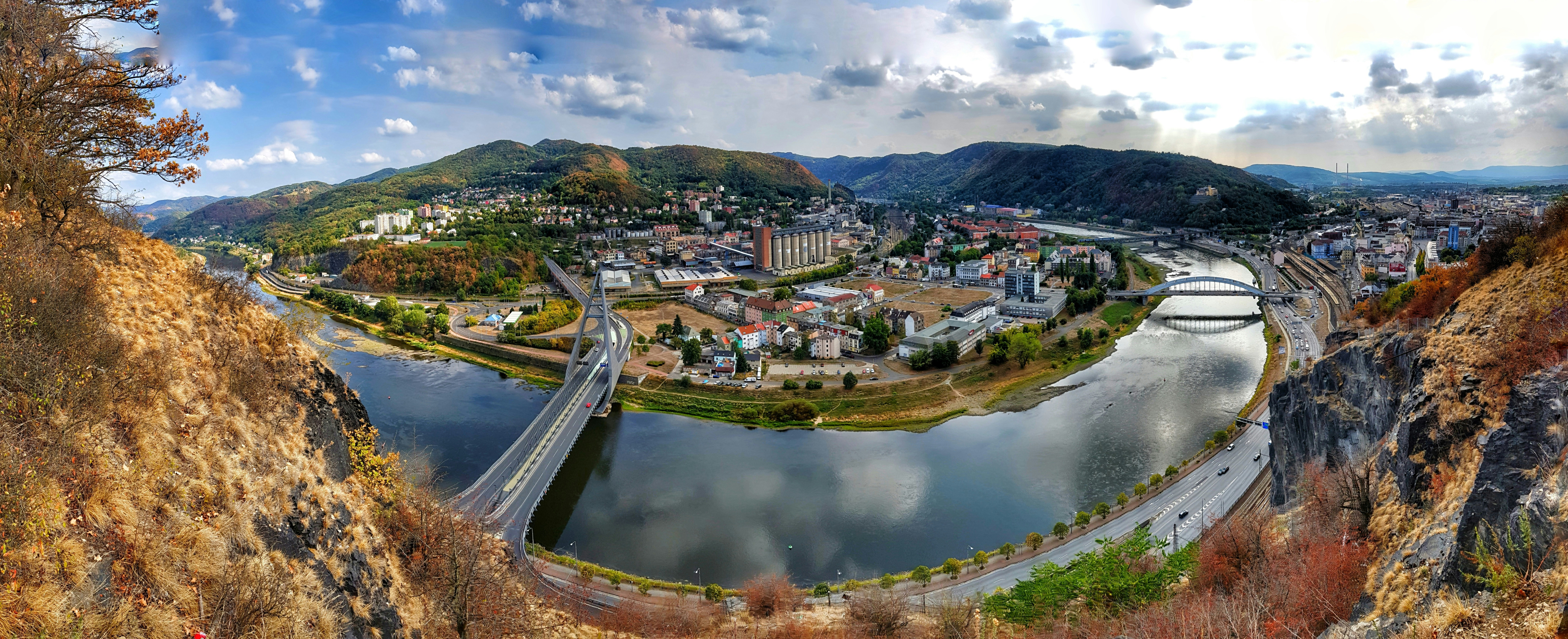 an aerial view of a city and a river