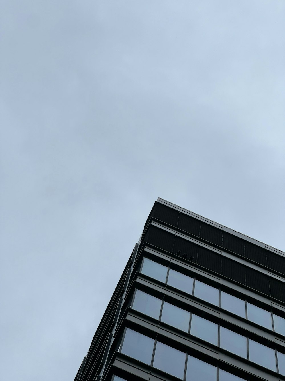 a tall building with a clock on the side of it