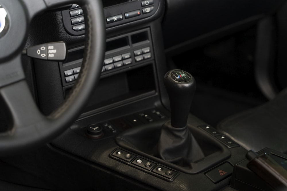 a steering wheel and dashboard of a car