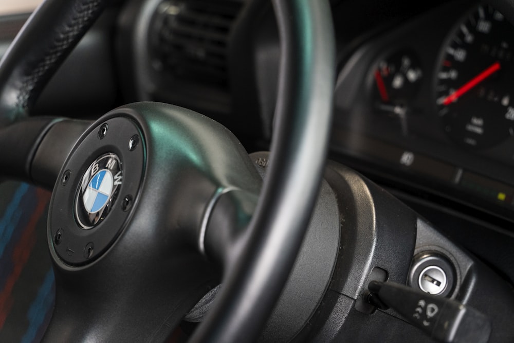 the steering wheel of a bmw car with a digital display