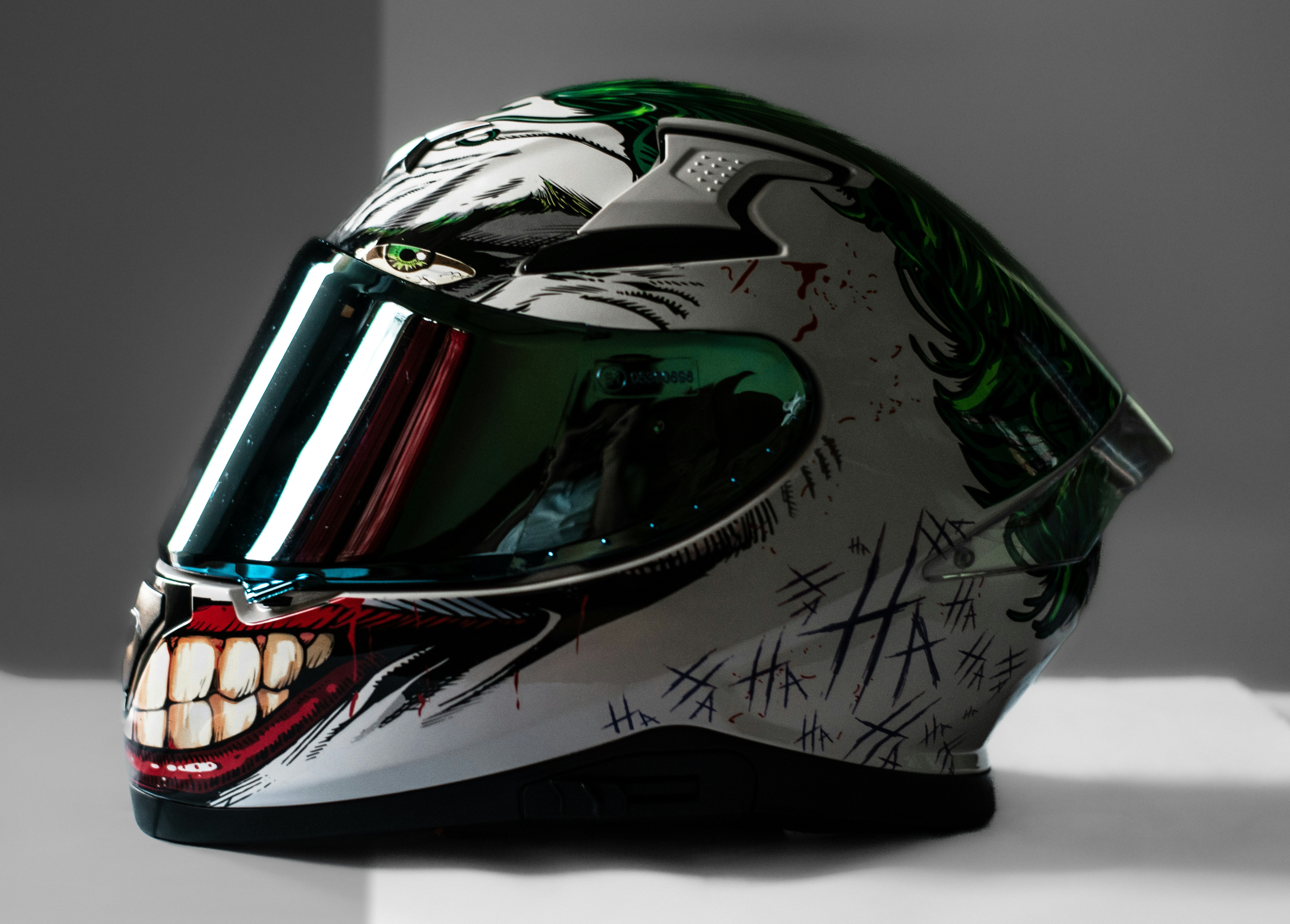 a helmet with a face painted on it