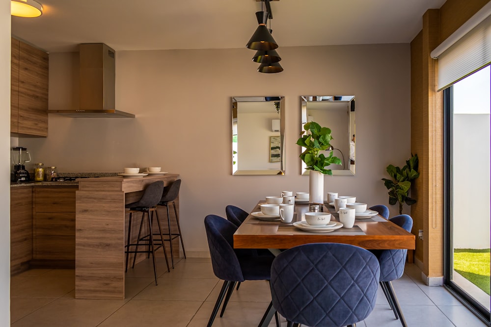 a dining room with a table and chairs