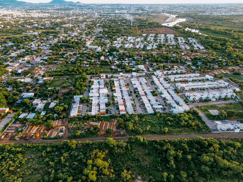 an aerial view of a city with lots of trees