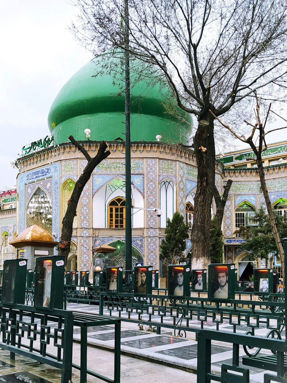 a building with a green dome on top of it