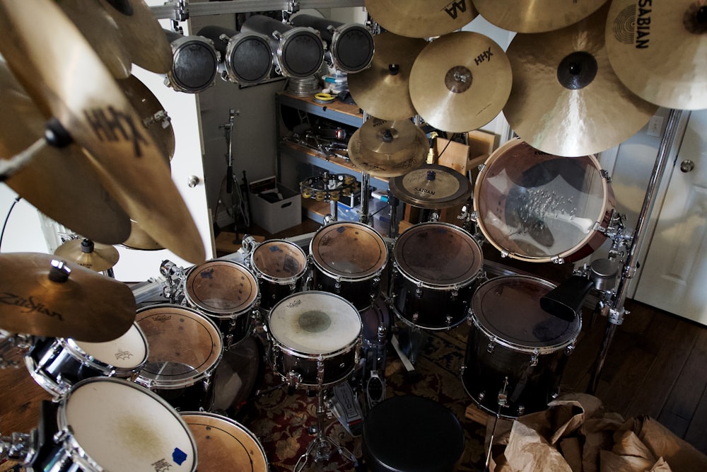 a bunch of drums that are in a room