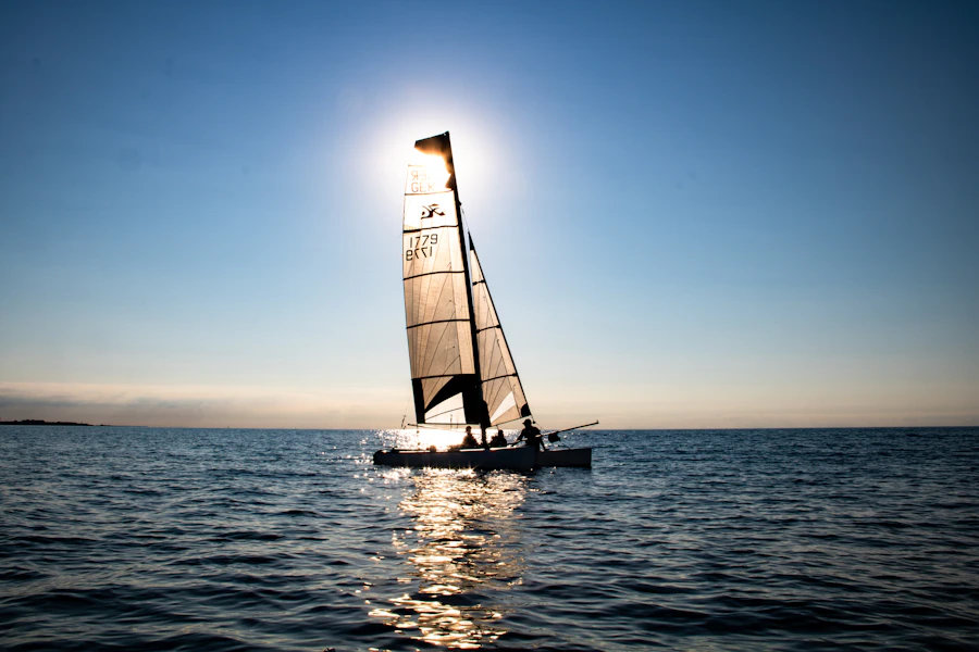 Sailboat on the ocean at sunset