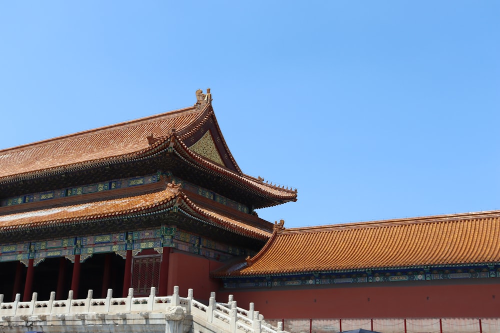 a tall building with a sky in the background