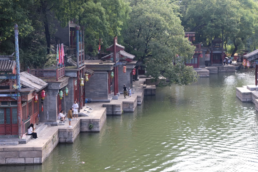 a body of water surrounded by buildings and trees