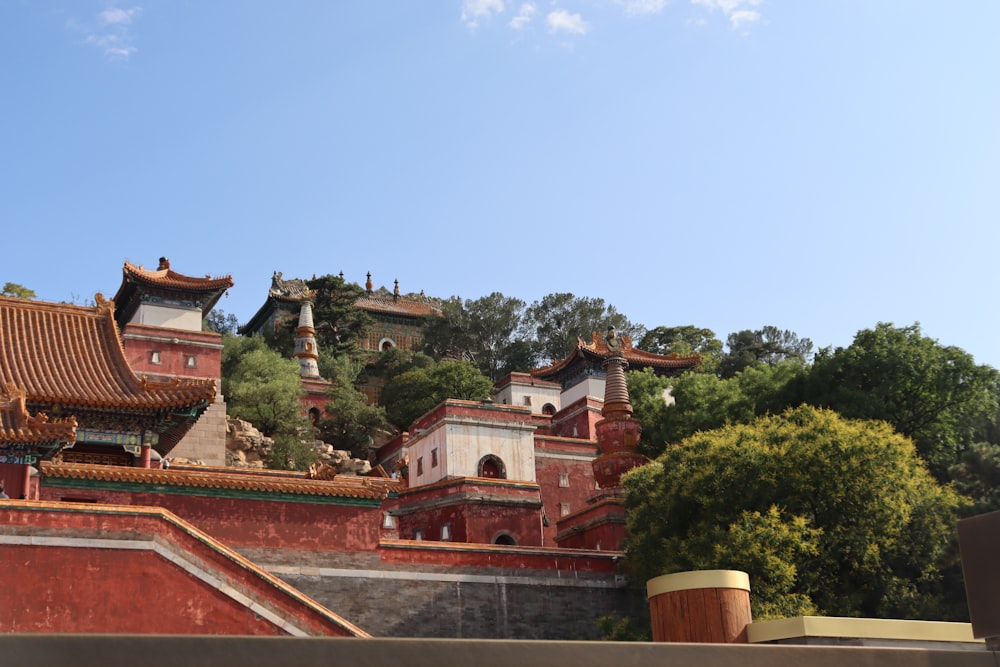 a large building with a lot of roof tops on top of it