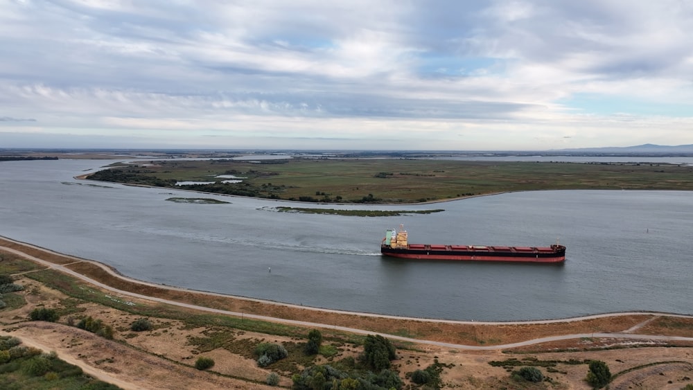 a large cargo ship sailing across a large body of water