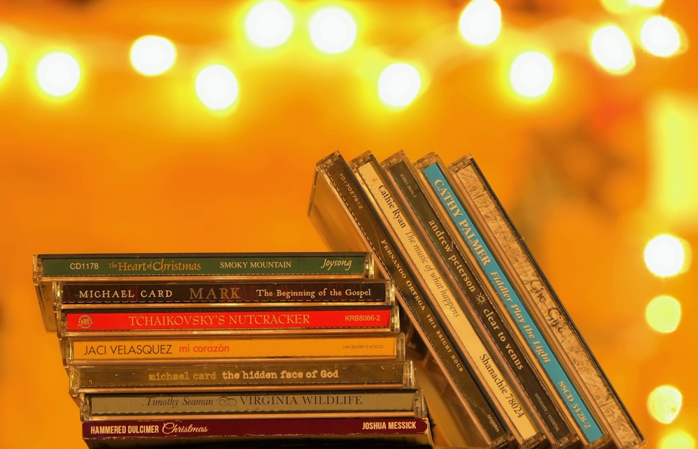 a stack of books sitting on top of a table