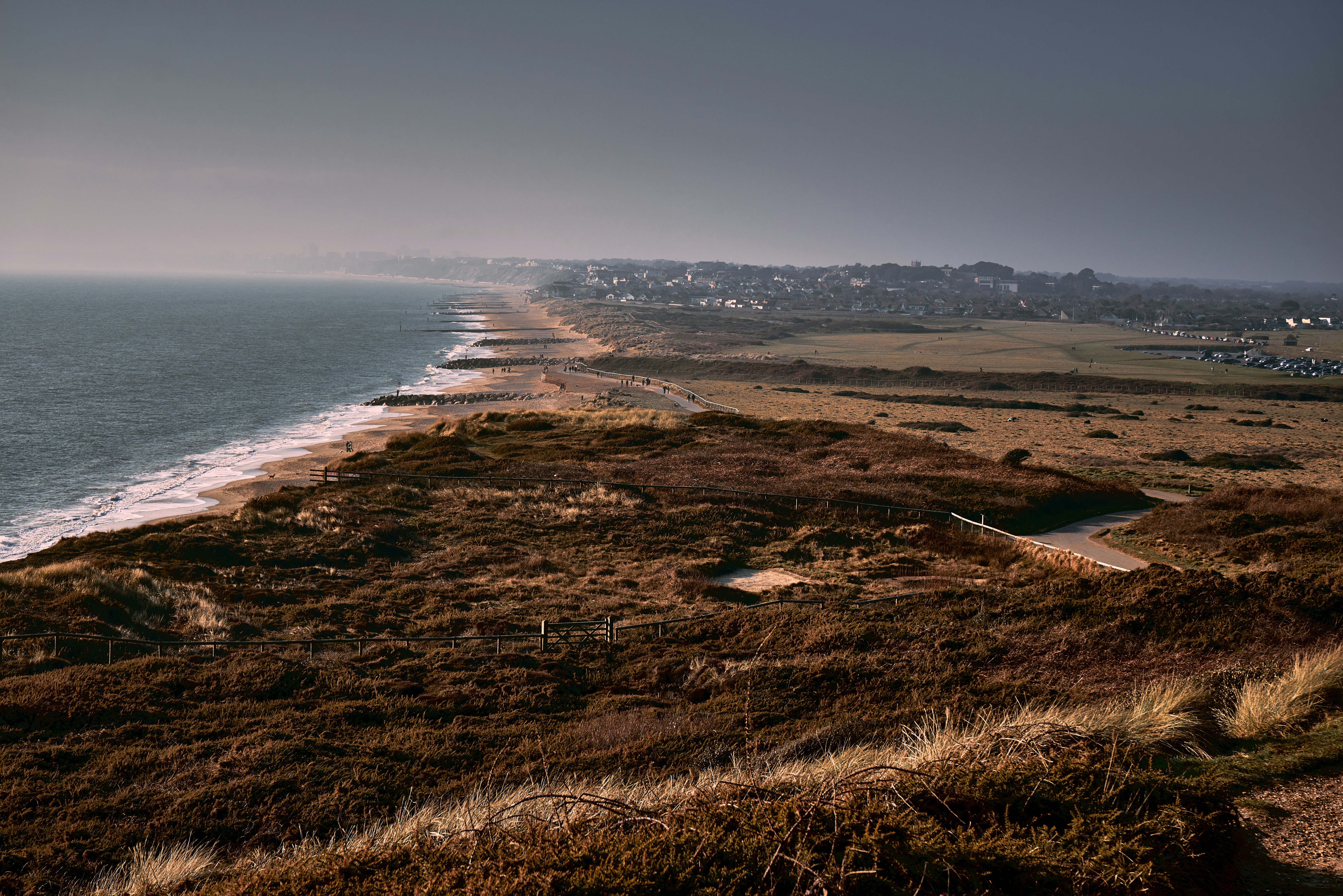 a view of the ocean from a hill