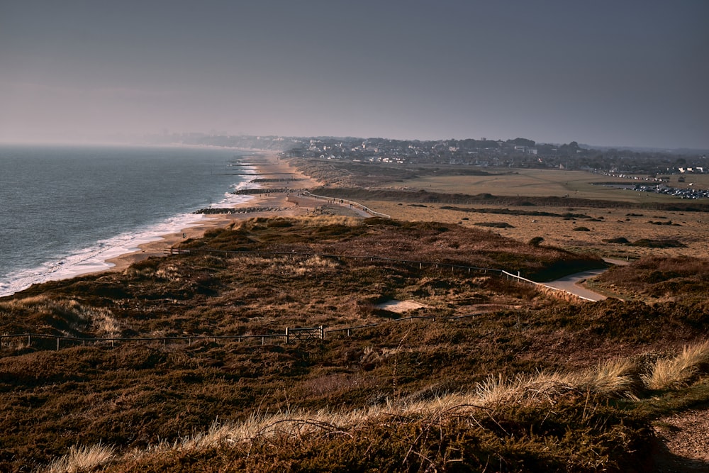 a view of the ocean from a hill