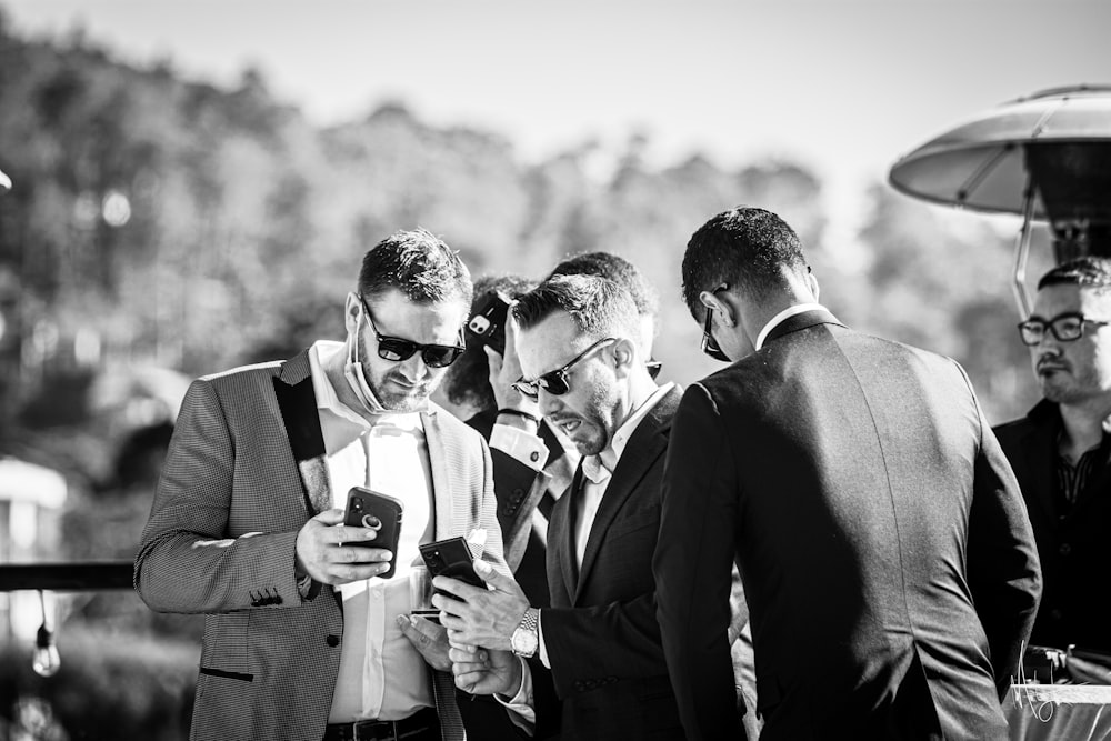 a group of men standing next to each other