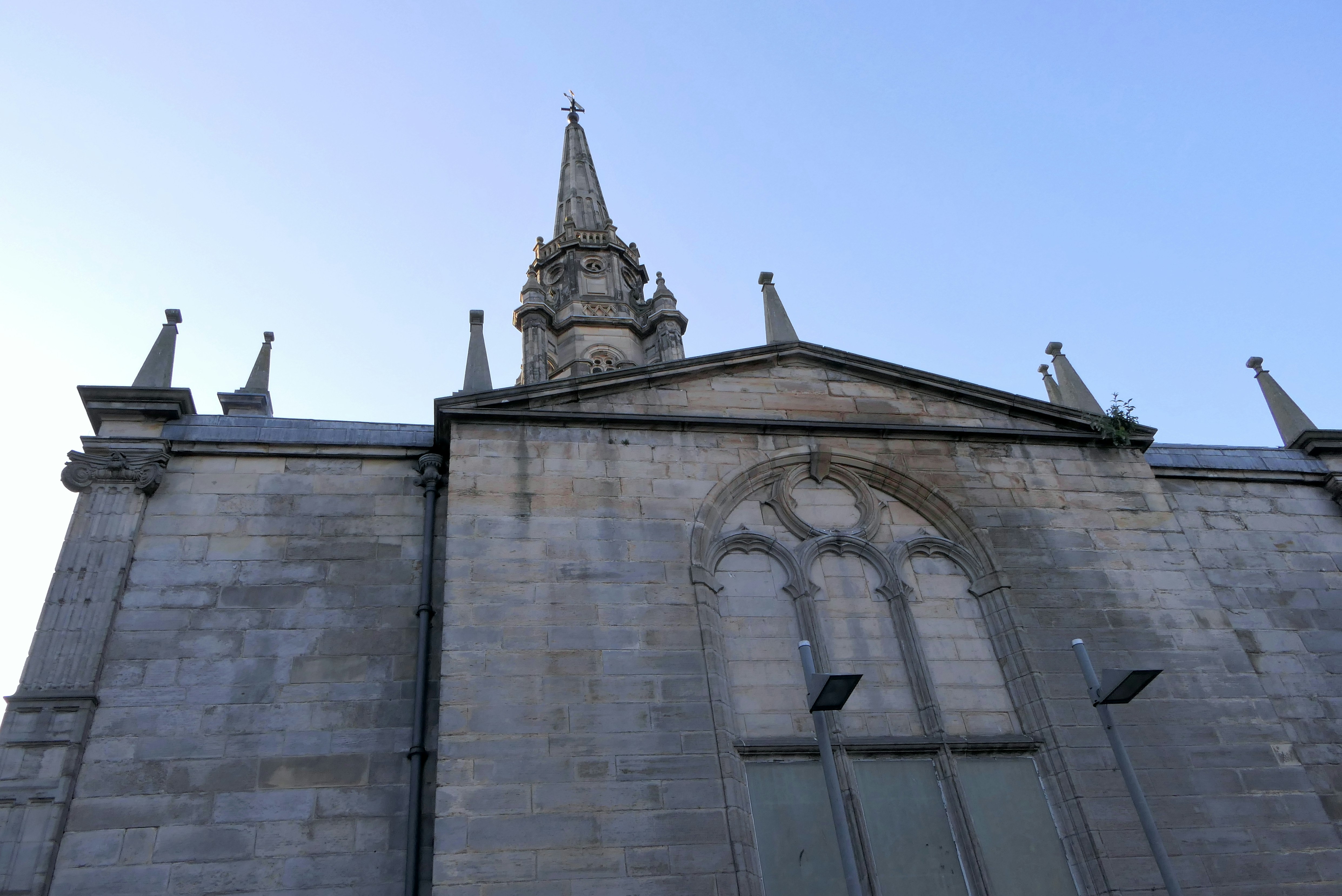 a tall building with a clock tower on top of it