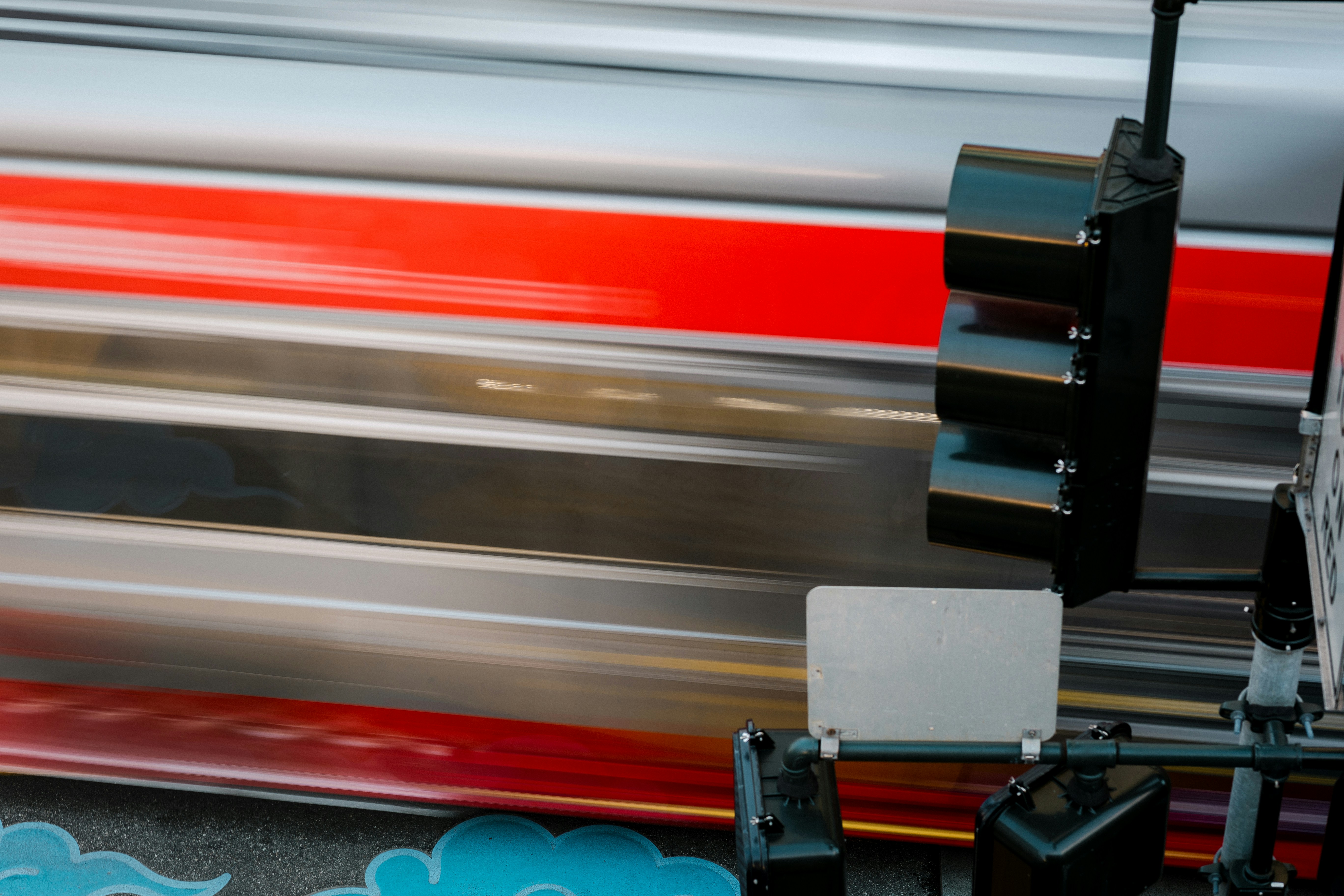 a blurry photo of a train passing by