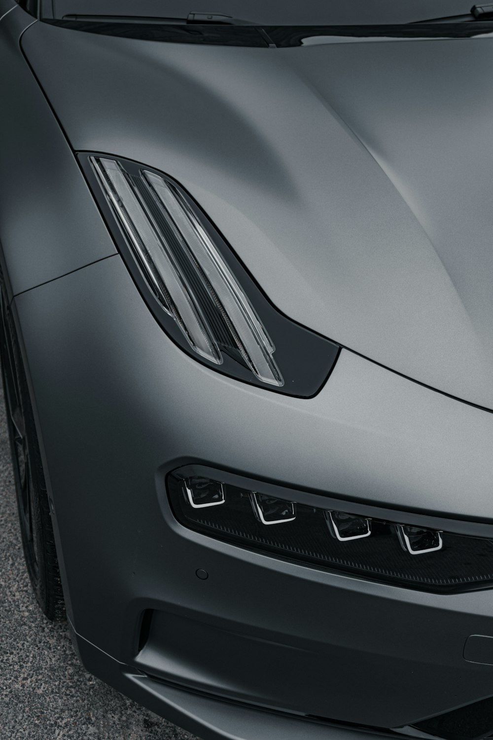 a close up of the front of a sports car