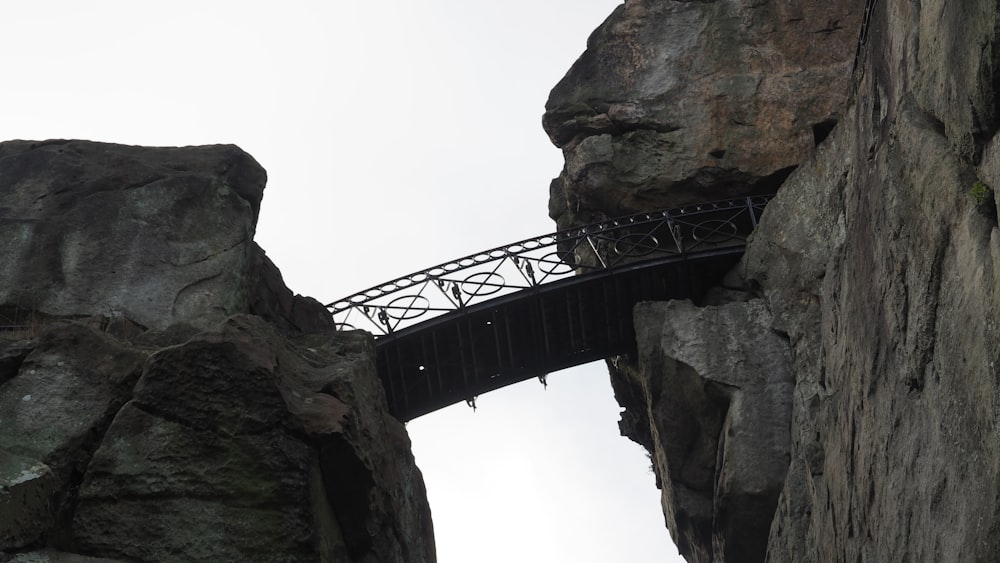 a bridge built into the side of a mountain