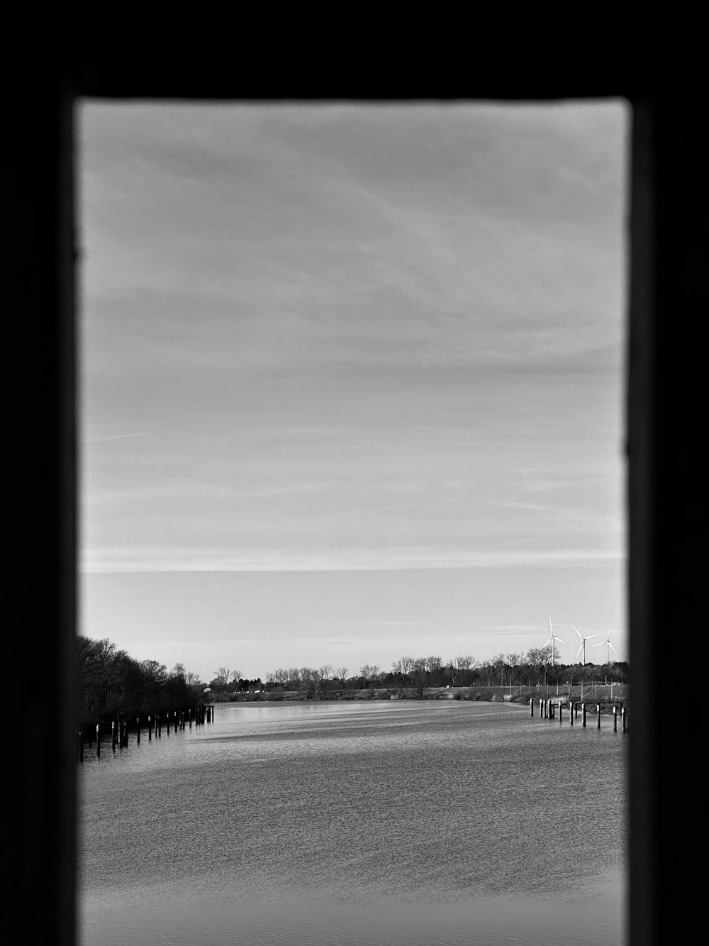 a black and white photo of a body of water