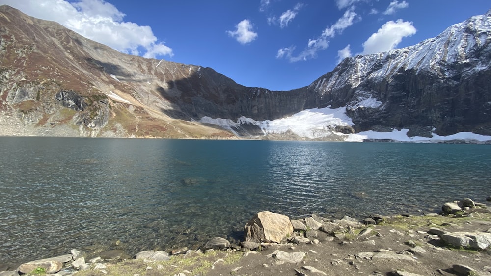 a large body of water surrounded by mountains