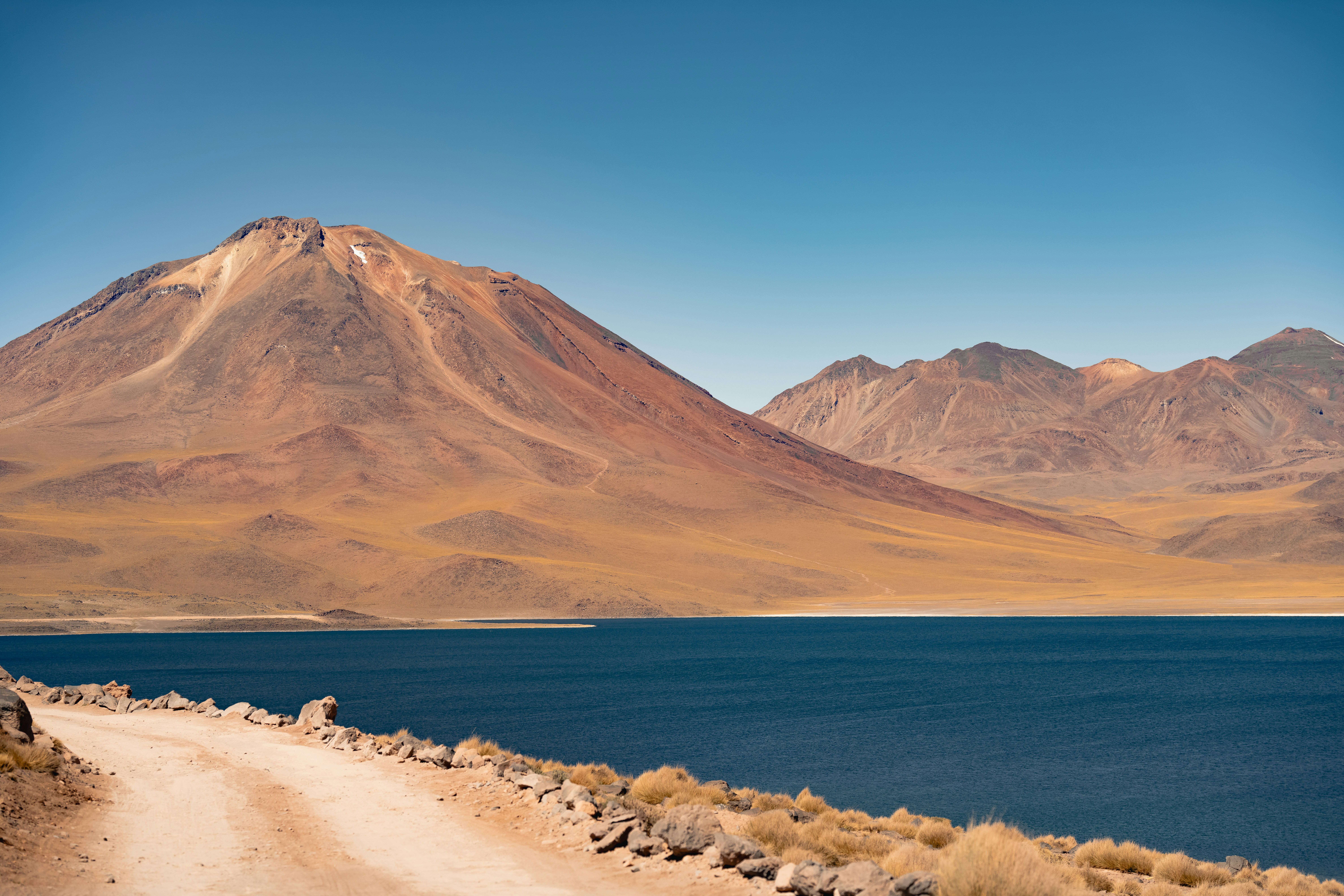 a large body of water surrounded by mountains