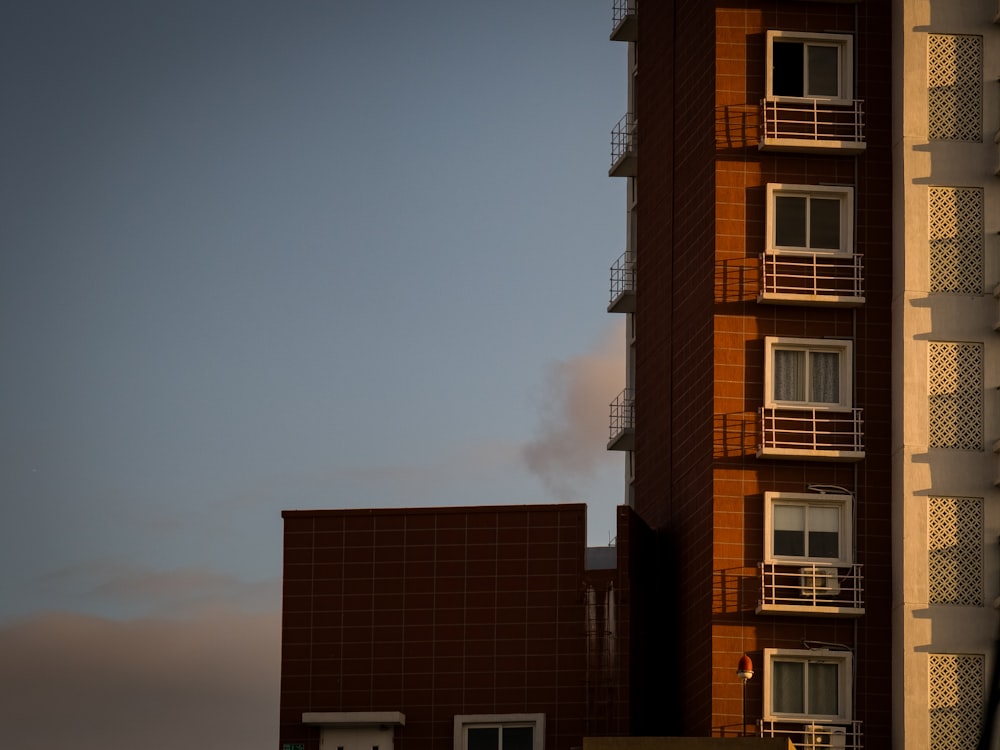 a tall building with balconies and balconies on the balconies