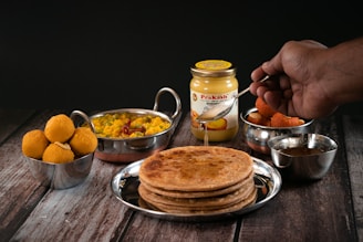 a plate of food on a wooden table